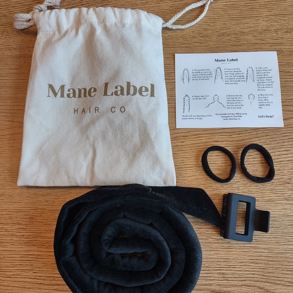 Mane Label, black velour Sway for hair styling.